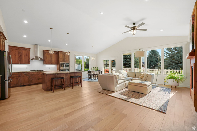 1238 Canyon View Road Midway, UT 84049 - Photo 11 of 33 Expansive open-concept living space with wood-finish flooring, vaulted ceilings, and recessed lighting