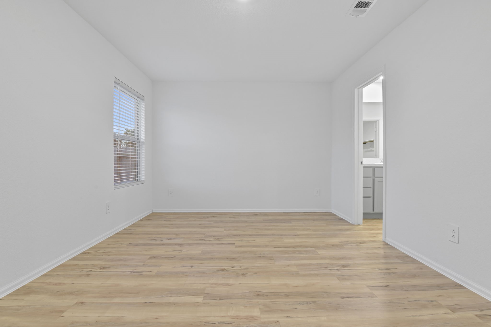 22156 Juniper Crossing Drive New Caney, TX 77357 - Photo 17 of 47 Primary Suite with Door to Ensuite Primary Bathroom on Right