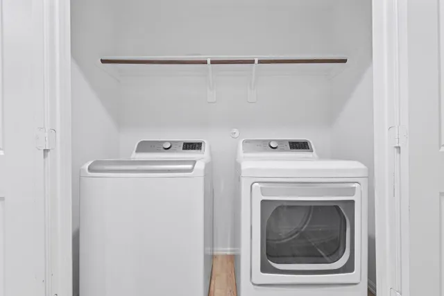 a utility room with dryer and washer