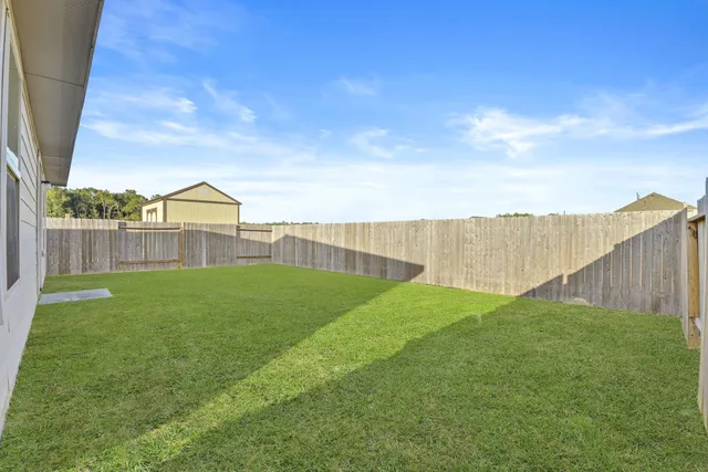 a view of a backyard with a garden