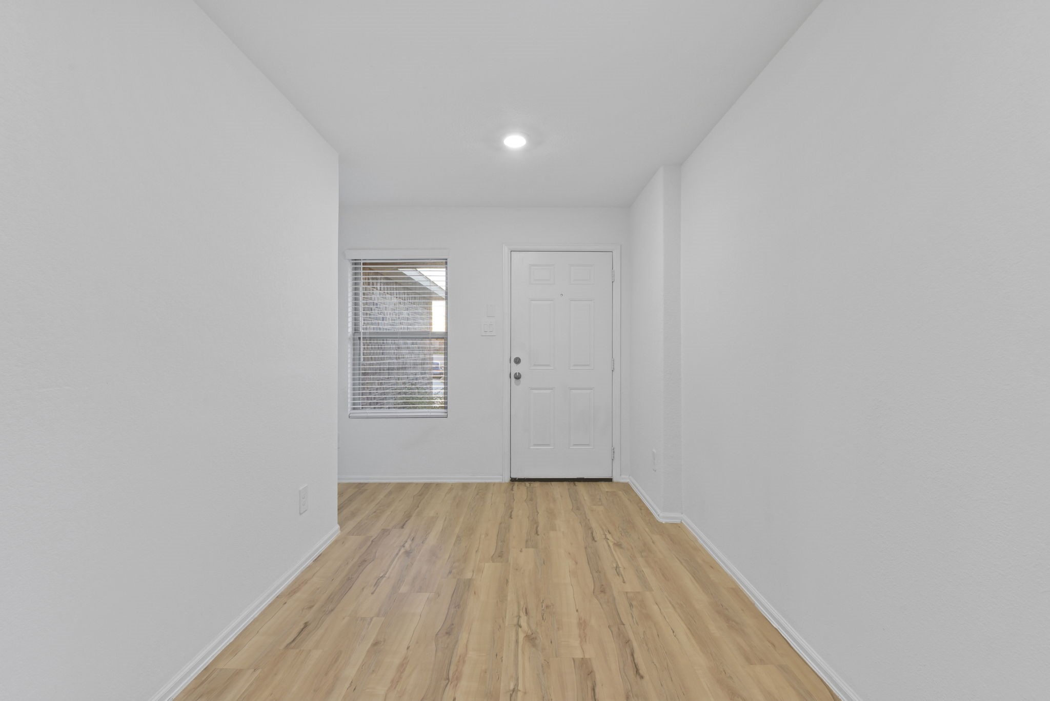 22156 Juniper Crossing Drive New Caney, TX 77357 - Photo 4 of 47 Entry Hall from the Front Door and Garage Door (around the corner to the left).