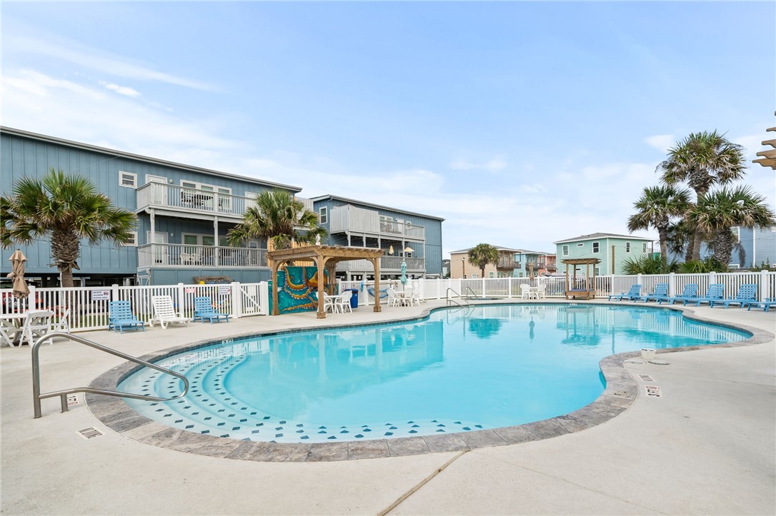 715 Beach Access Road, Unit 1005 Port Aransas, TX 78373 - Photo 21 of 28 a view of a swimming pool with a patio