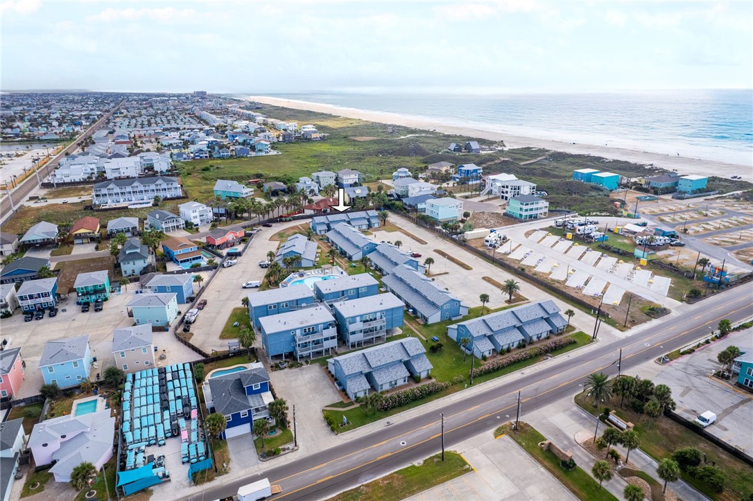 715 Beach Access Road, Unit 1005 Port Aransas, TX 78373 - Photo 27 of 28 an aerial view of residential building and parking space