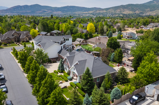 1263 Chapman Court Alpine, UT 84004 - Photo 81 of 83 Aerial perspective of suburban area featuring a mountainous background