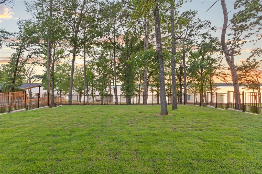 426 Lost Pittsburg, TX 75686 - Photo 3 of 40 a big yard with trees and in front of it