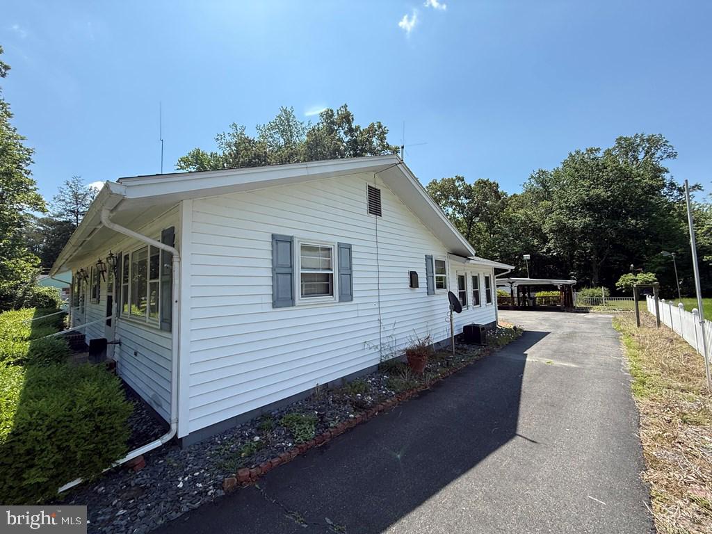 664 Sandy Point Road Heathsville, VA 22473 - Photo 2 of 12 Charming home with serene surroundings.