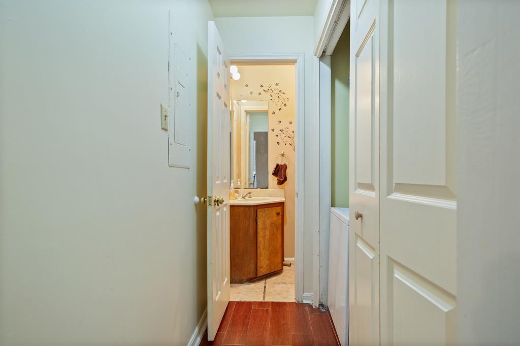 2529 Rio Grande Street, Unit 7 Austin, TX 78705 - Photo 12 of 13 a view of a hallway with wooden floor and closet