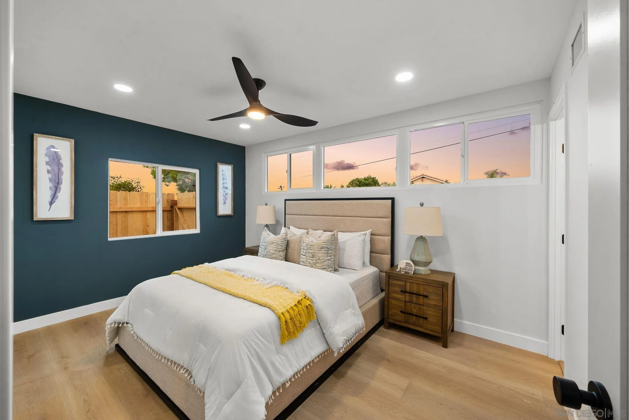 2121 Cardinal Drive San Diego, CA 92108 - Photo 11 of 27 a bedroom with a large bed and a large window