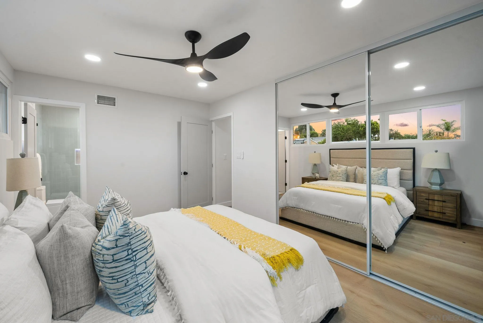 2121 Cardinal Drive San Diego, CA 92108 - Photo 12 of 27 a bedroom with a bed and window