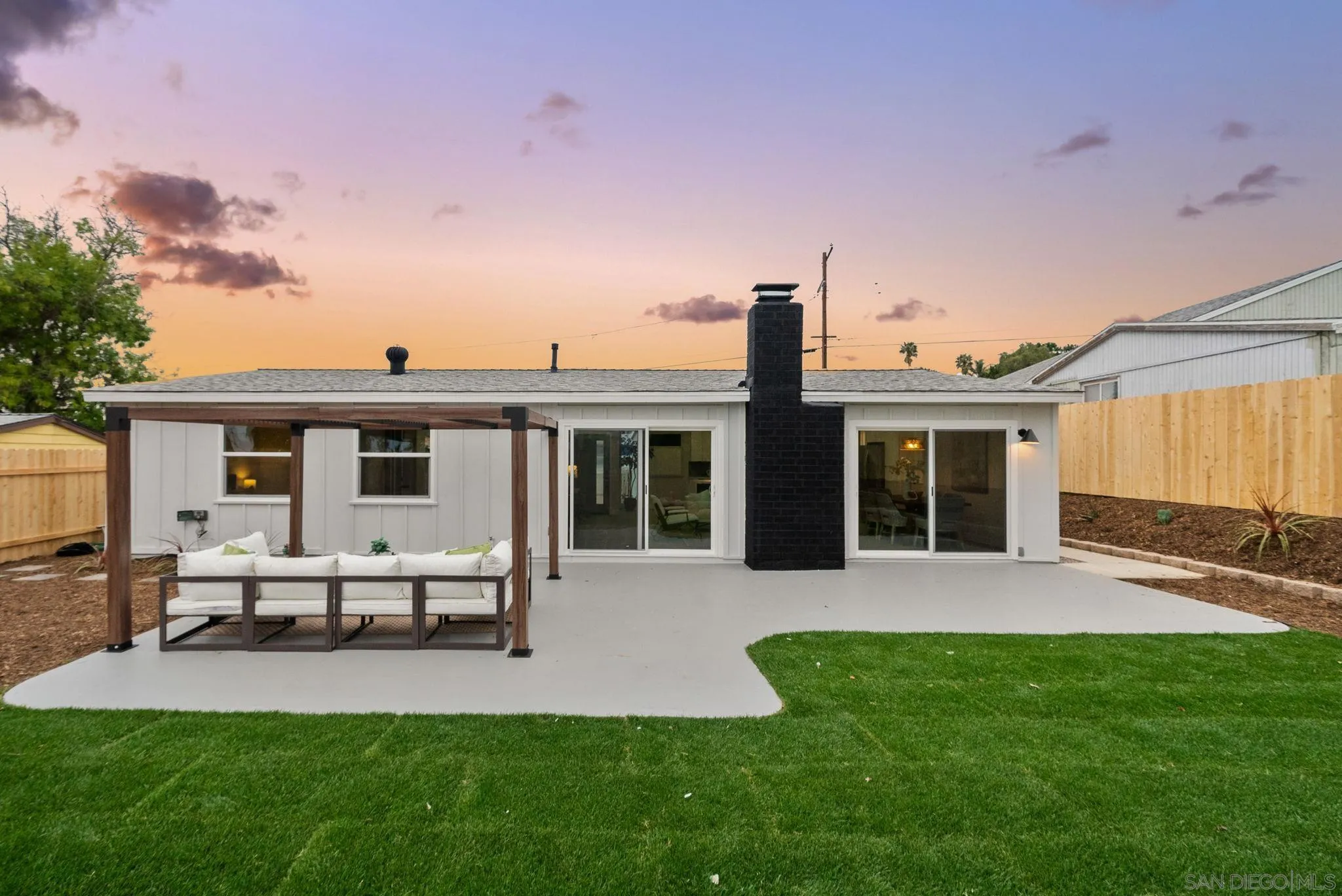 2121 Cardinal Drive San Diego, CA 92108 - Photo 19 of 27 a view of a house with a backyard