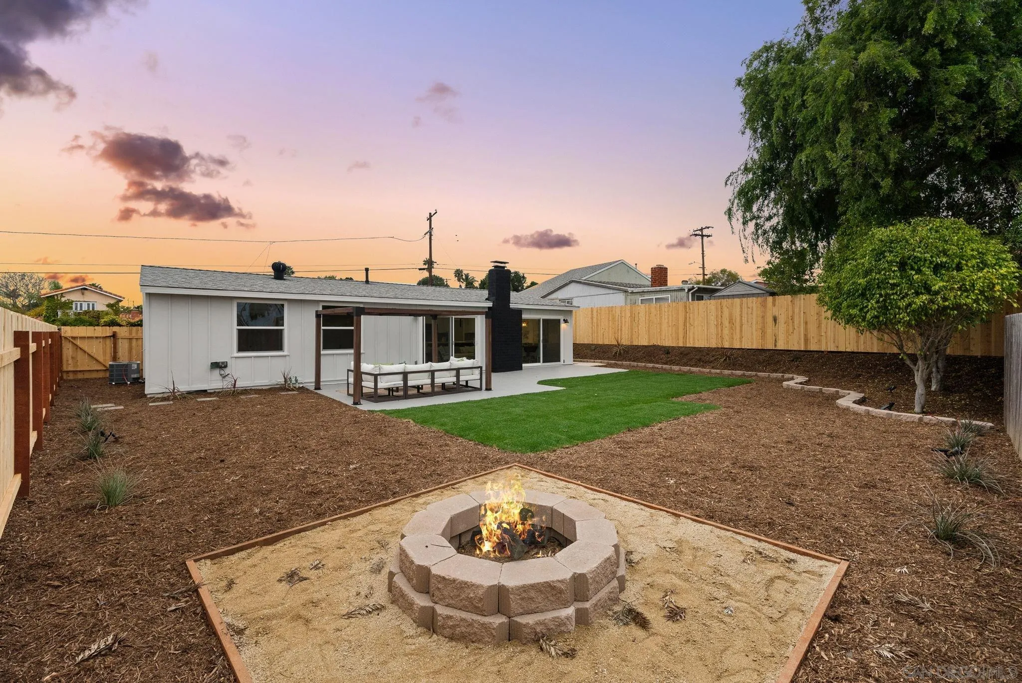 2121 Cardinal Drive San Diego, CA 92108 - Photo 20 of 27 a view of a house with backyard and sitting area