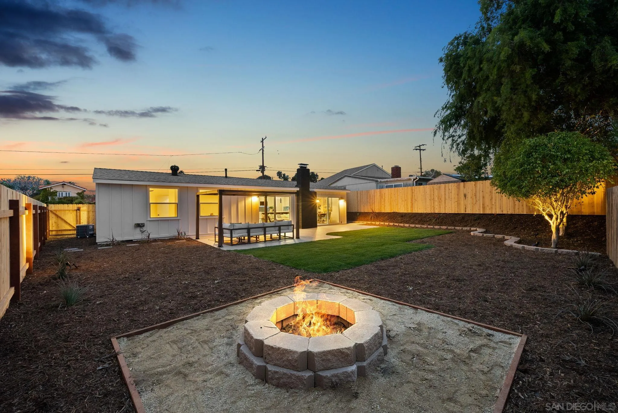 2121 Cardinal Drive San Diego, CA 92108 - Photo 22 of 27 a view of a house with a yard