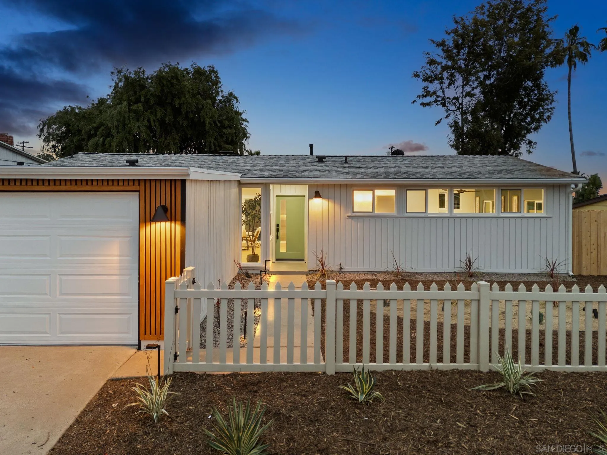 2121 Cardinal Drive San Diego, CA 92108 - Photo 25 of 27 a front view of a house having yard