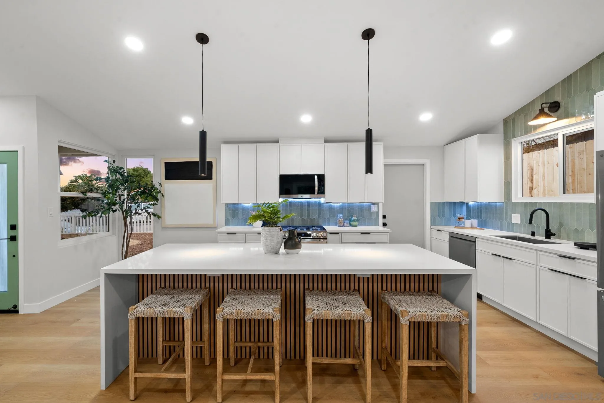 2121 Cardinal Drive San Diego, CA 92108 - Photo 5 of 27 a kitchen with counter space appliances and a center island