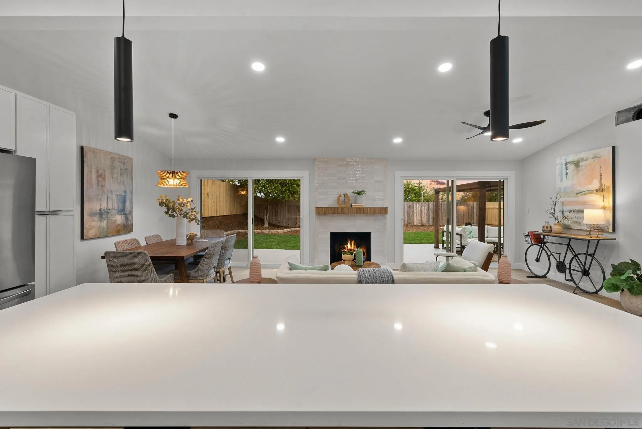 2121 Cardinal Drive San Diego, CA 92108 - Photo 8 of 27 a living room with fireplace furniture and a large window