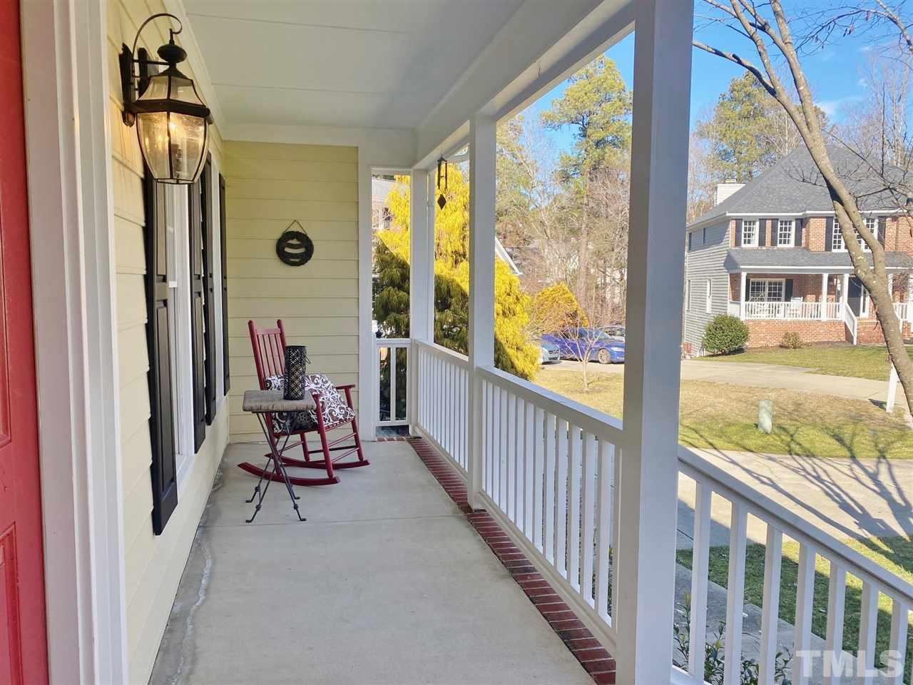 12009 Shavenrock Place Raleigh, NC 27613 - Photo 2 of 30 a view of a balcony with chairs