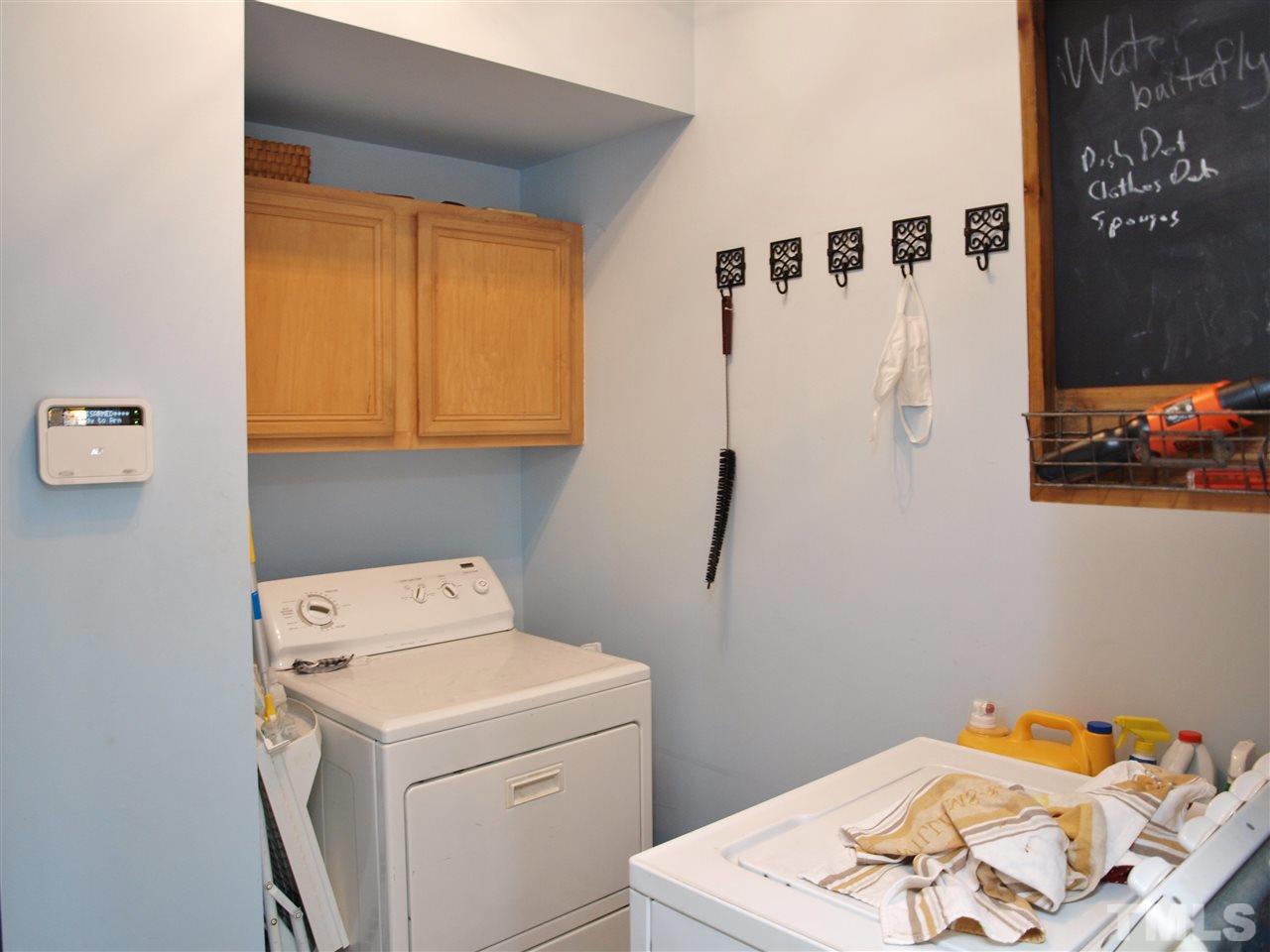 12009 Shavenrock Place Raleigh, NC 27613 - Photo 14 of 30 a utility room with dryer and washer