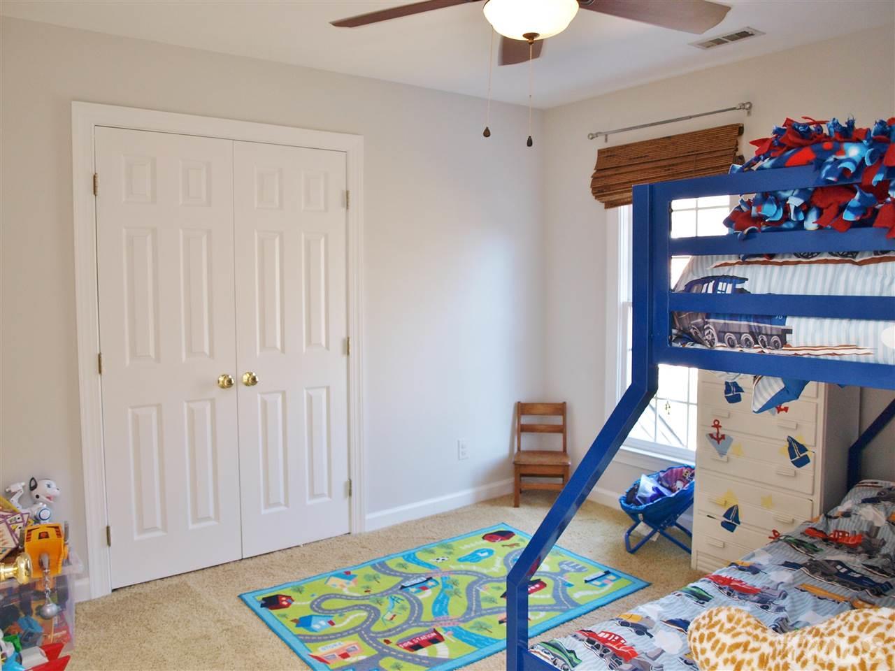 12009 Shavenrock Place Raleigh, NC 27613 - Photo 24 of 30 a view of an entryway with wooden floor