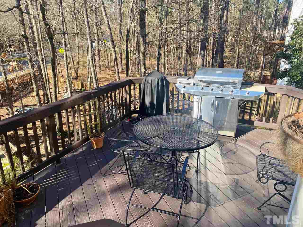 12009 Shavenrock Place Raleigh, NC 27613 - Photo 29 of 30 a view of a chairs and table in the balcony