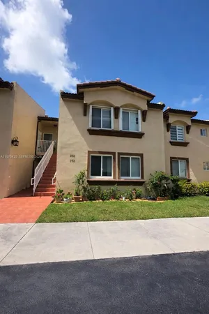 a front view of house with yard