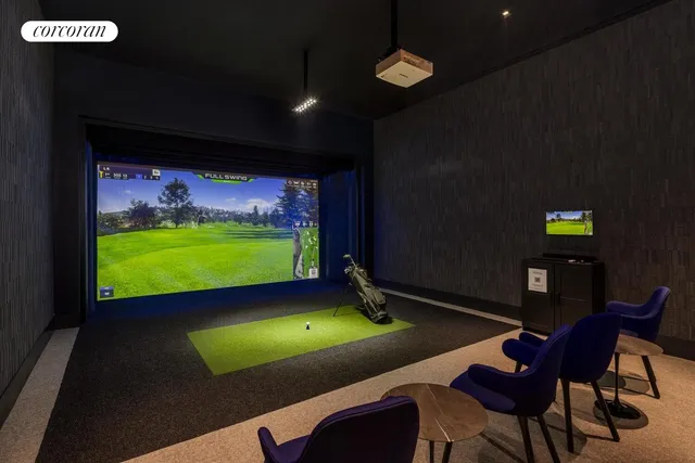 a room with furniture and a flat screen tv