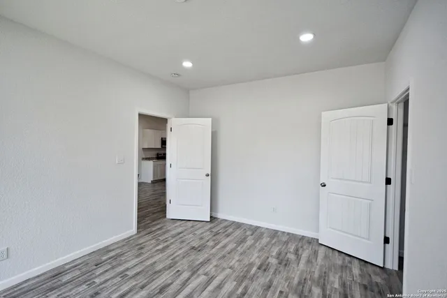 a view of kitchen with wooden floor