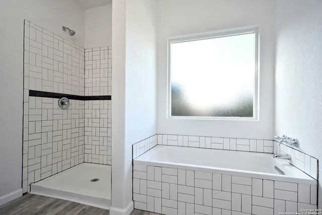 a bathroom with a toilet a sink a vanity and mirror