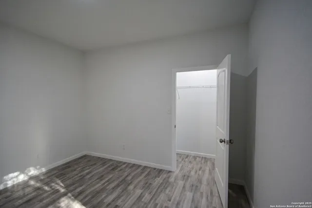 a view of entryway with wooden floor