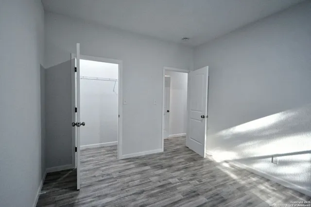 a view of small space with racks on the wall