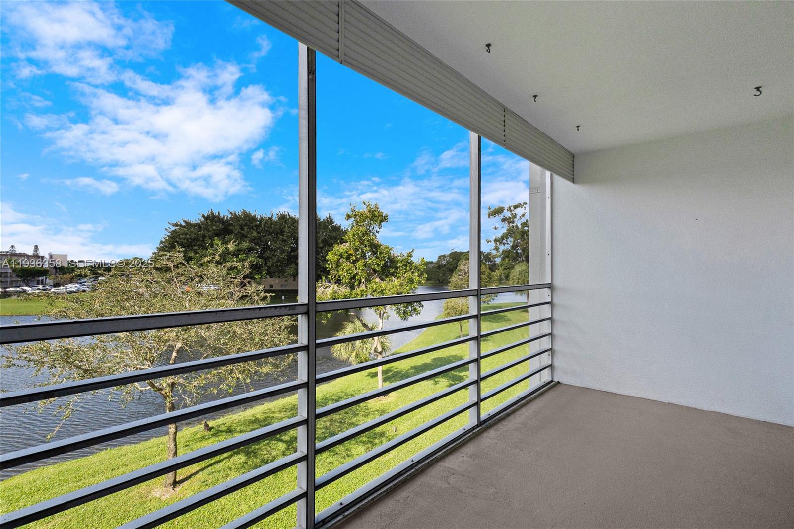 3030 Lincoln B, Unit 3030 Boca Raton, FL 33434 - Photo 21 of 25 a view of outdoor space with seating