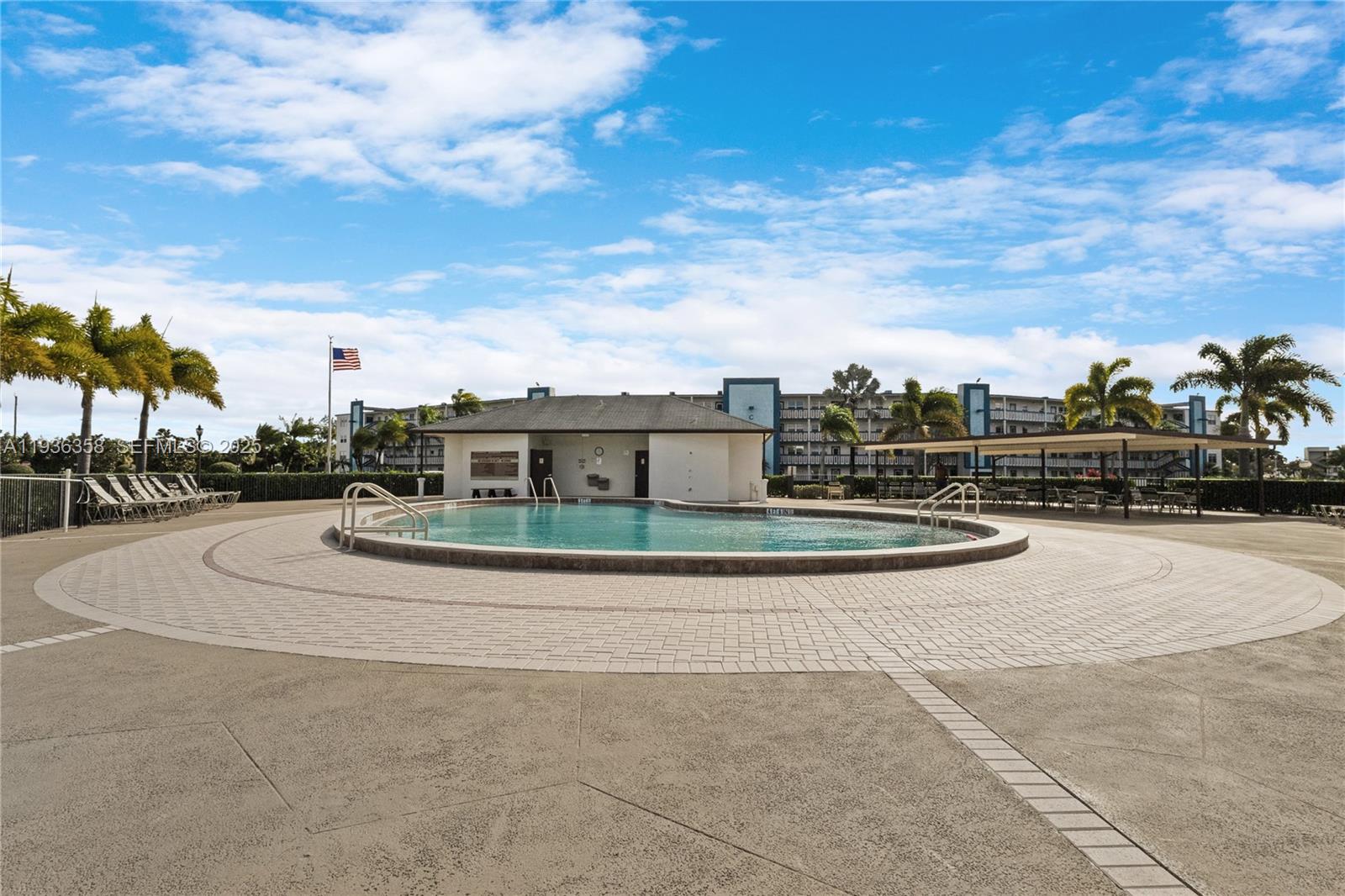 3030 Lincoln B, Unit 3030 Boca Raton, FL 33434 - Photo 25 of 25 a view of large parking space and building