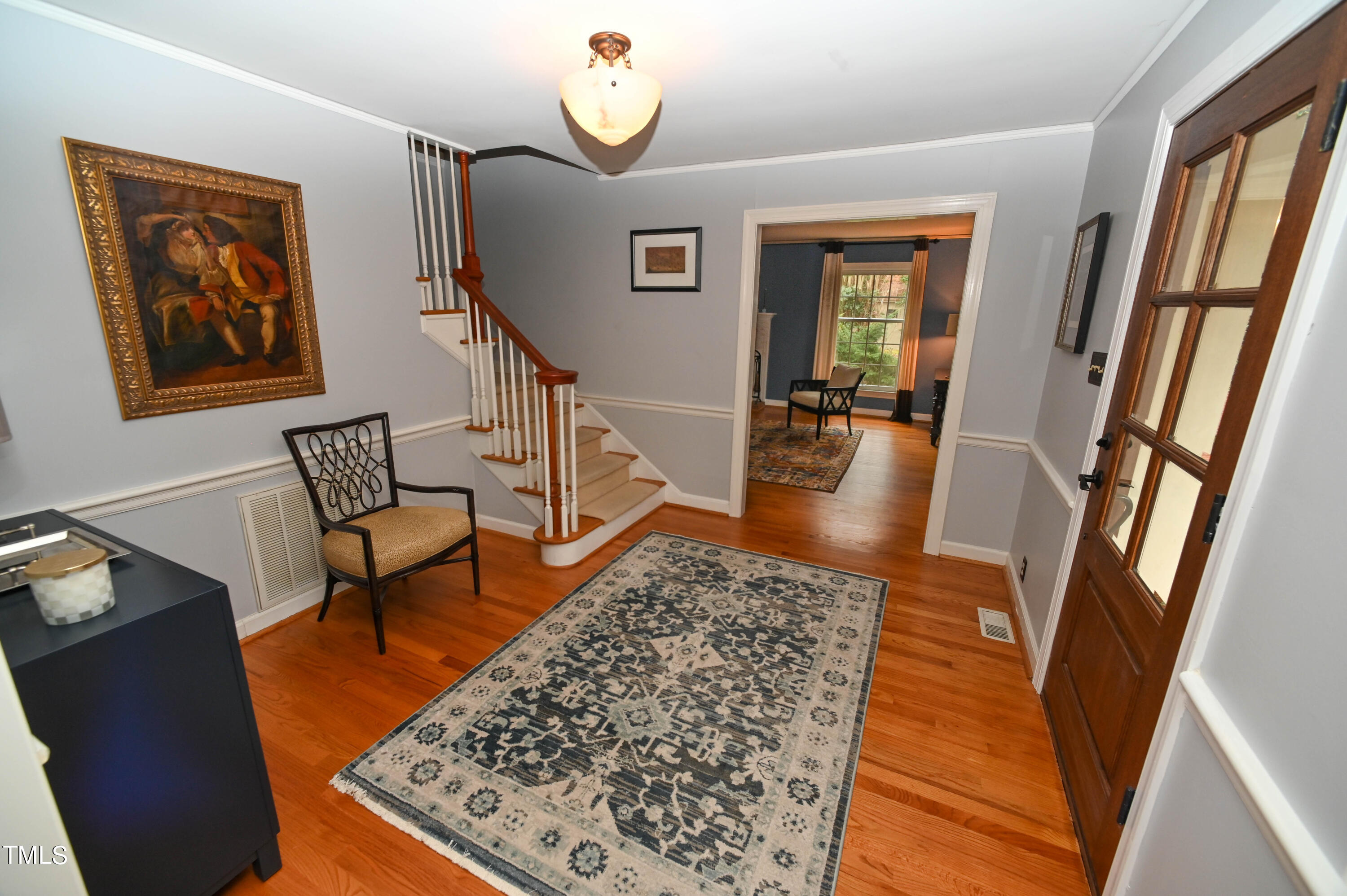 5313 Alpine Drive Raleigh, NC 27609 - Photo 4 of 20 a living room with furniture and a rug
