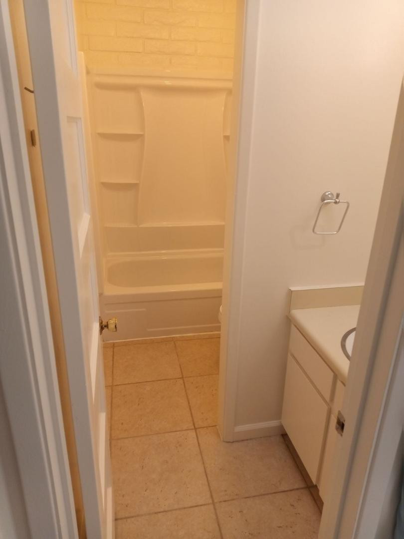 4140 East Cliffside Trail, Unit H Rimrock, AZ 86335 - Photo 5 of 15 a bathroom with a shower and a sink