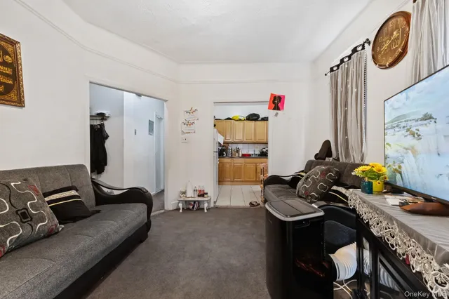 a room with furniture and gym equipment