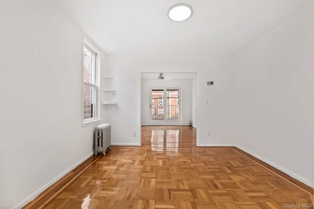 a view of an empty room and window