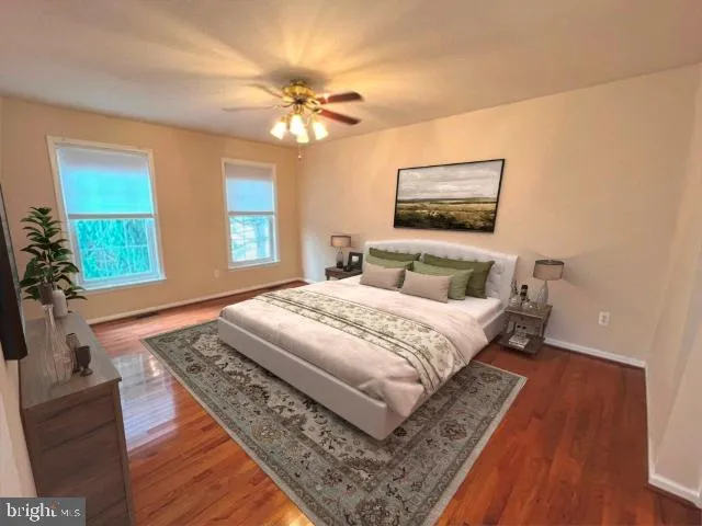 a bedroom with bed and window