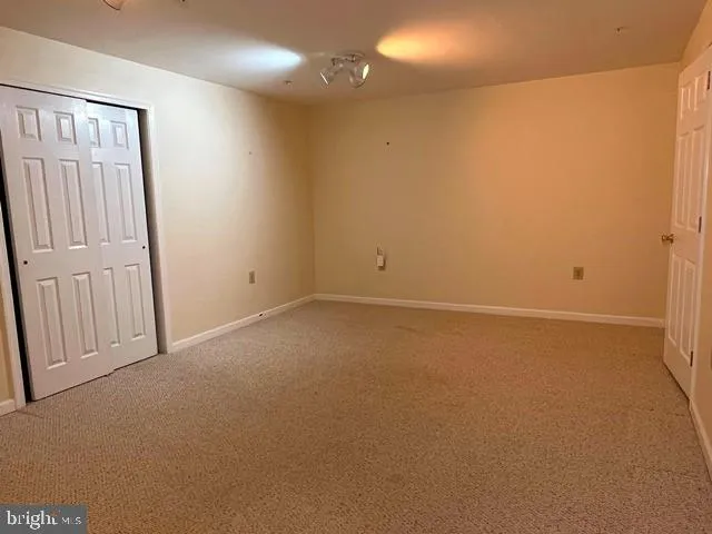 en empty room with windows