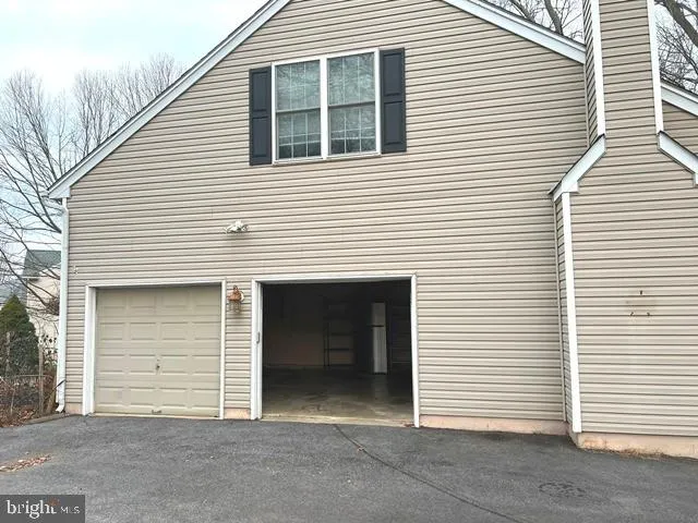 a view of a house with white door