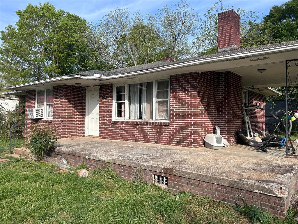 213 East Shockley Ferry Road Anderson, SC 29624 - Photo 11 of 20 This brick residence features a spacious porch, offering a welcoming outdoor living space.