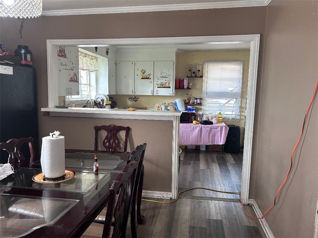 213 East Shockley Ferry Road Anderson, SC 29624 - Photo 13 of 20 This open-concept layout seamlessly connects the dining area to the adjacent kitchen, promoting an inviting flow.