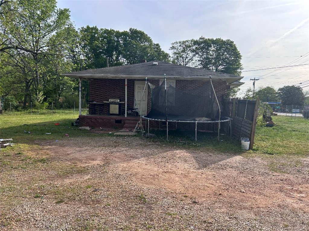 213 East Shockley Ferry Road Anderson, SC 29624 - Photo 5 of 20 This residence features a classic brick exterior and a comfortable covered porch.