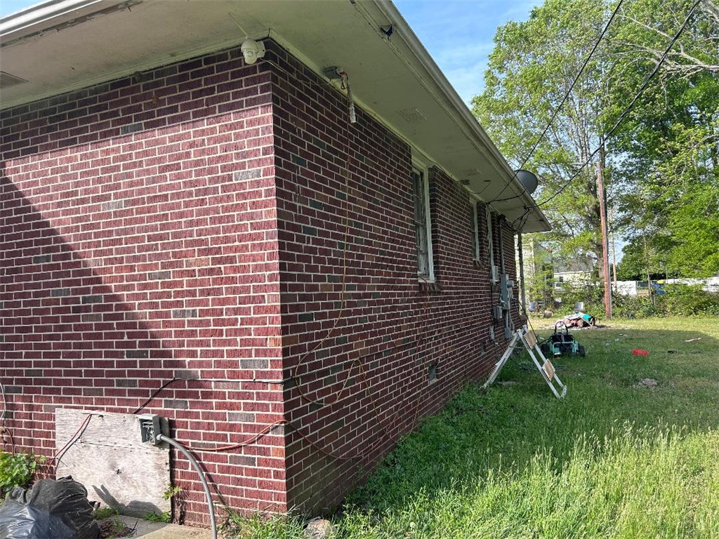 213 East Shockley Ferry Road Anderson, SC 29624 - Photo 7 of 20 This classic brick residence features a durable exterior and a spacious private yard.