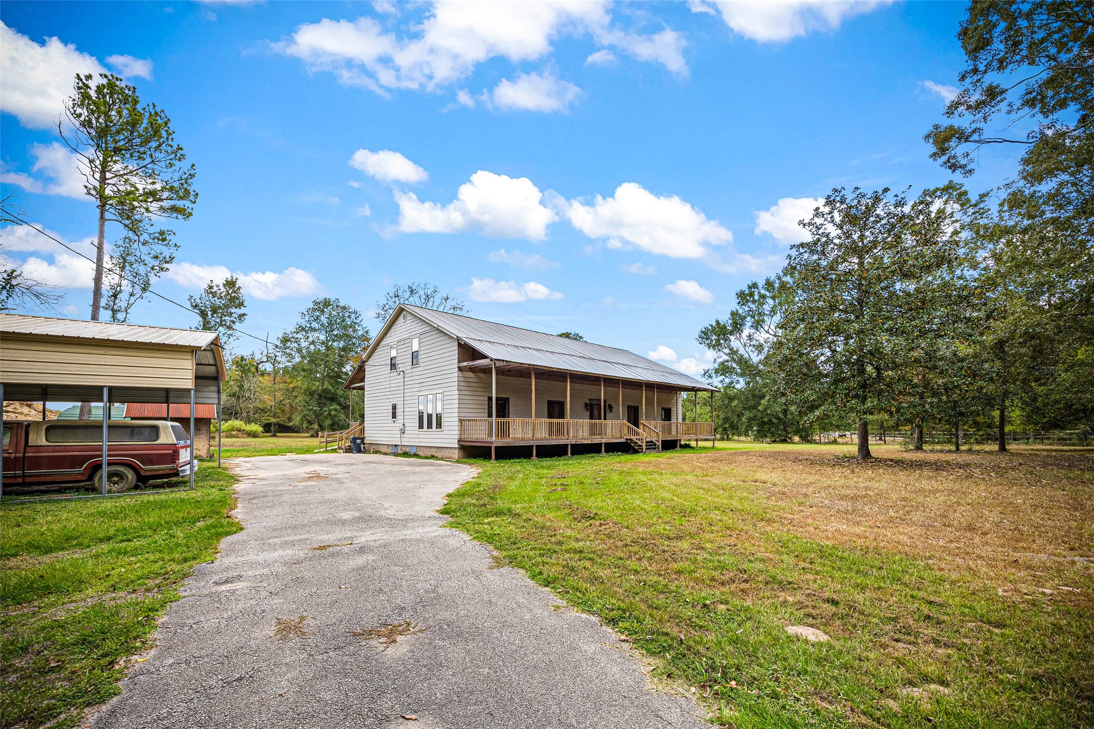 7 Northwood Country Road Huffman, TX 77336 - Photo 1 of 50 a view of a yard in front of a house
