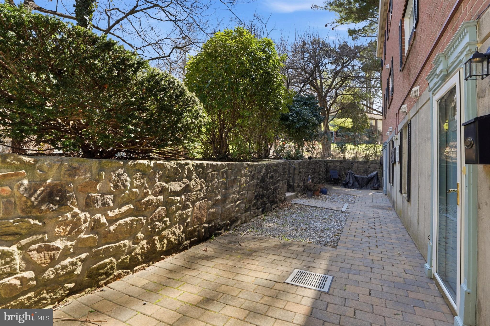 207 Walnut Hill Road, Unit B1 West Chester, PA 19382 - Photo 3 of 13 a view of a pathway both side of the house