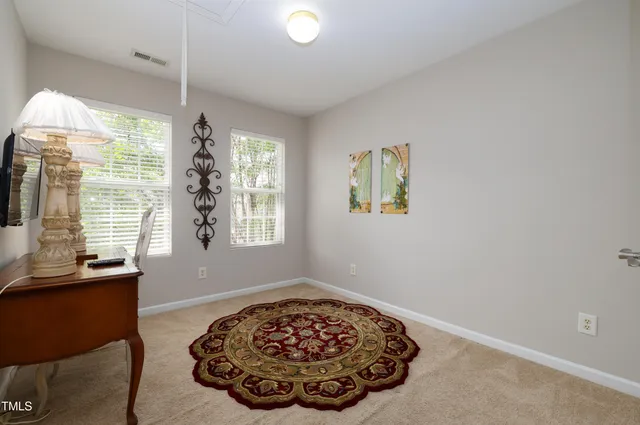a view of a bedroom with a window