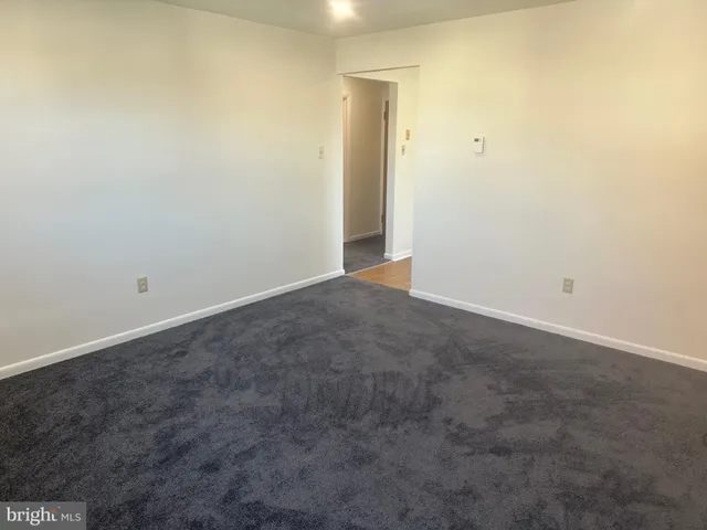 an empty room with an entryway