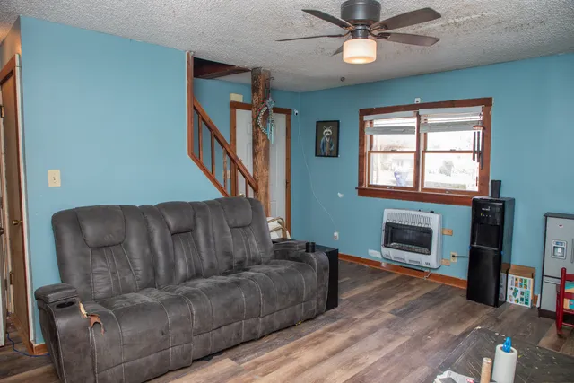 a view of a dresser with wooden floor