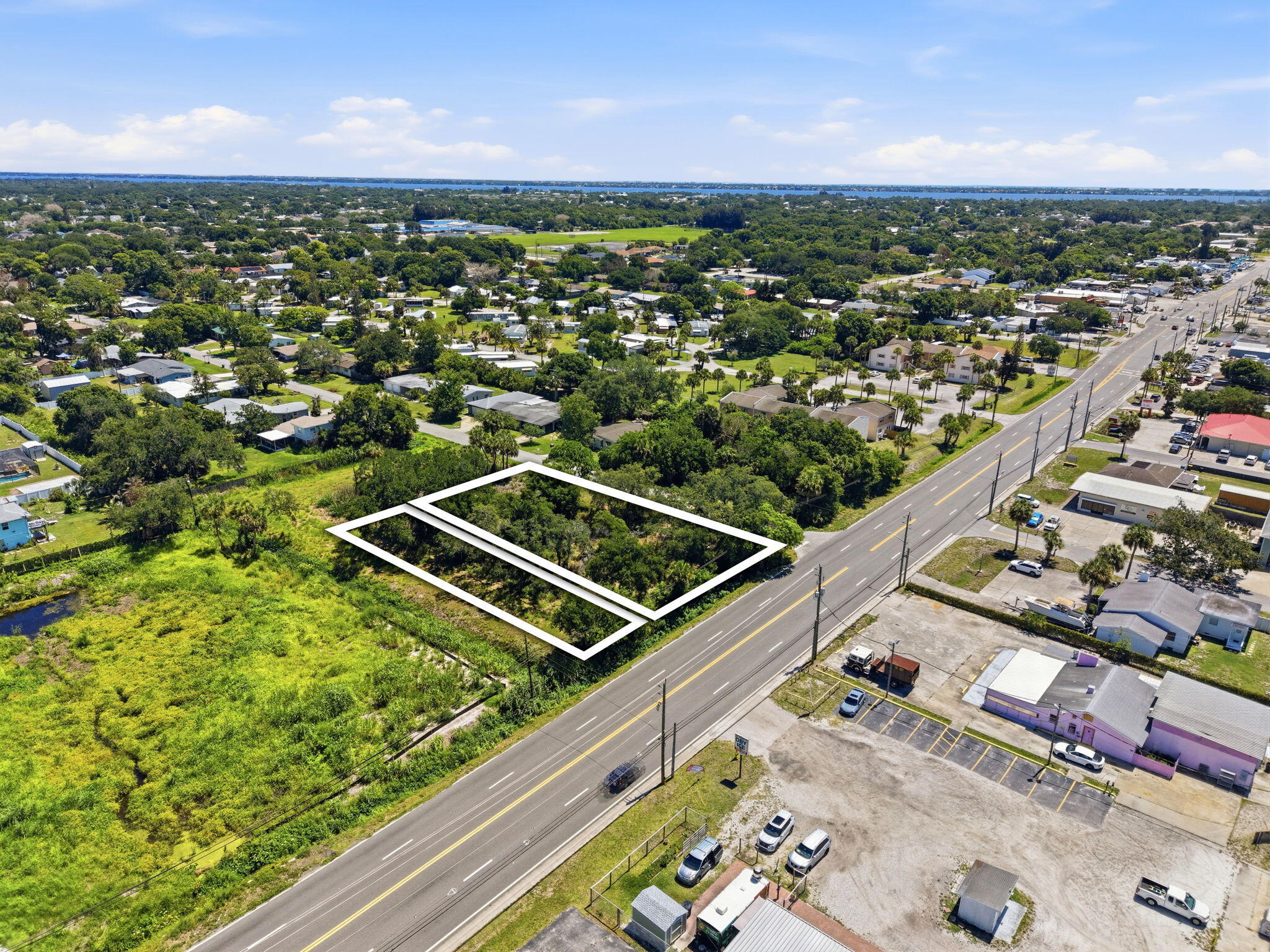 0 Aurora Road Melbourne, FL 32935 - Photo 19 of 20 an aerial view of residential houses with outdoor space