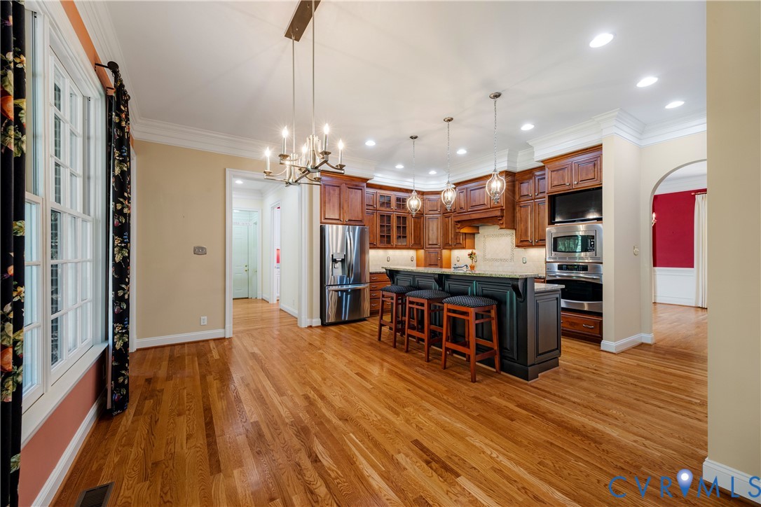 628 Cedar Run Road Manakin-Sabot, VA 23103 - Photo 23 of 70 Access to the rear hallway with powder room, laund