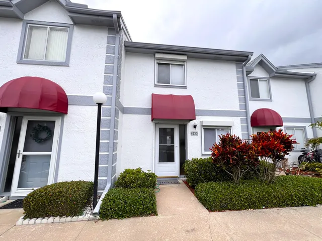 a house view with a outdoor space